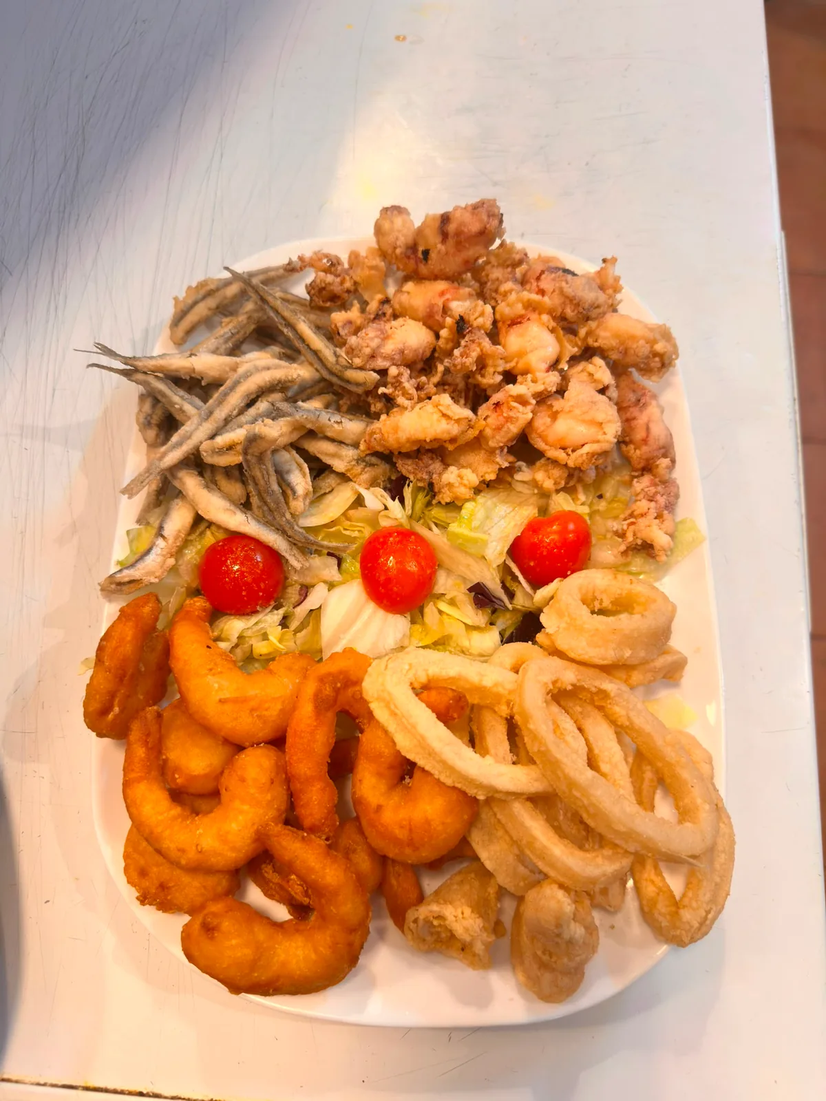 Assorted fried fish: anchovies, squid, baby squid and prawns